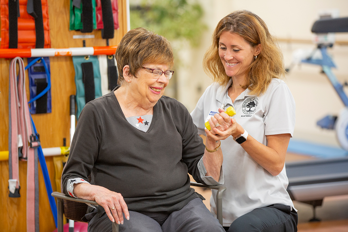 Physical therapist along with patient