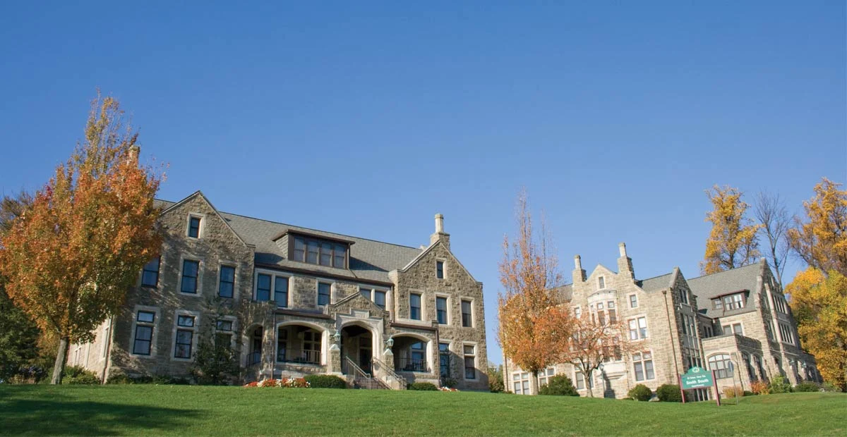 Stone buildings housing senior living apartments.