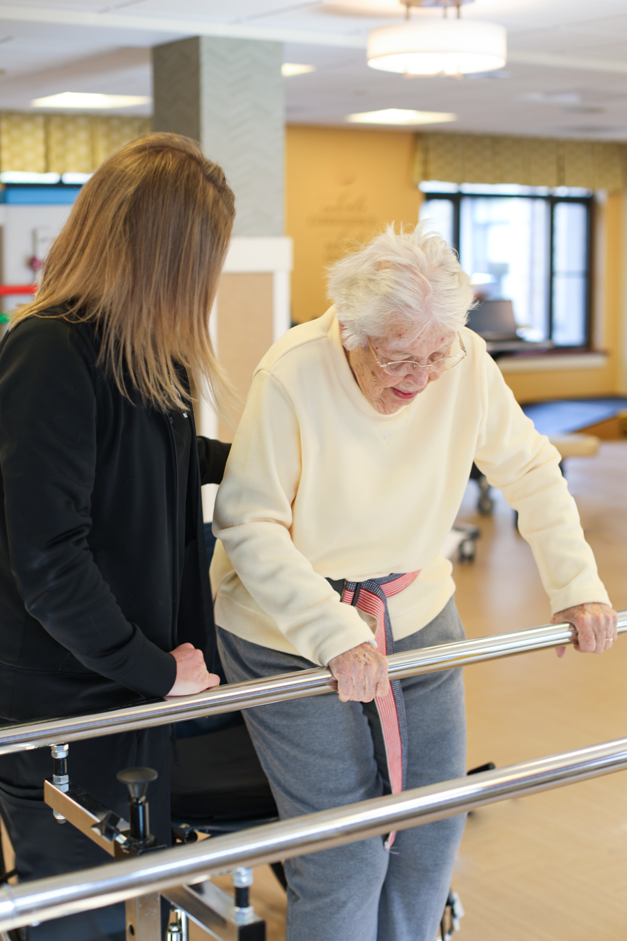 Resident working with physical therapist